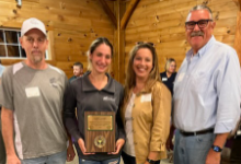 Left to right: Tom Roth, president of NGLCO, Sabrina Rahz, Mary Beth Miller - board member of NGLCO, and Dave Richards - Sabrina's teacher in 2017-2018
